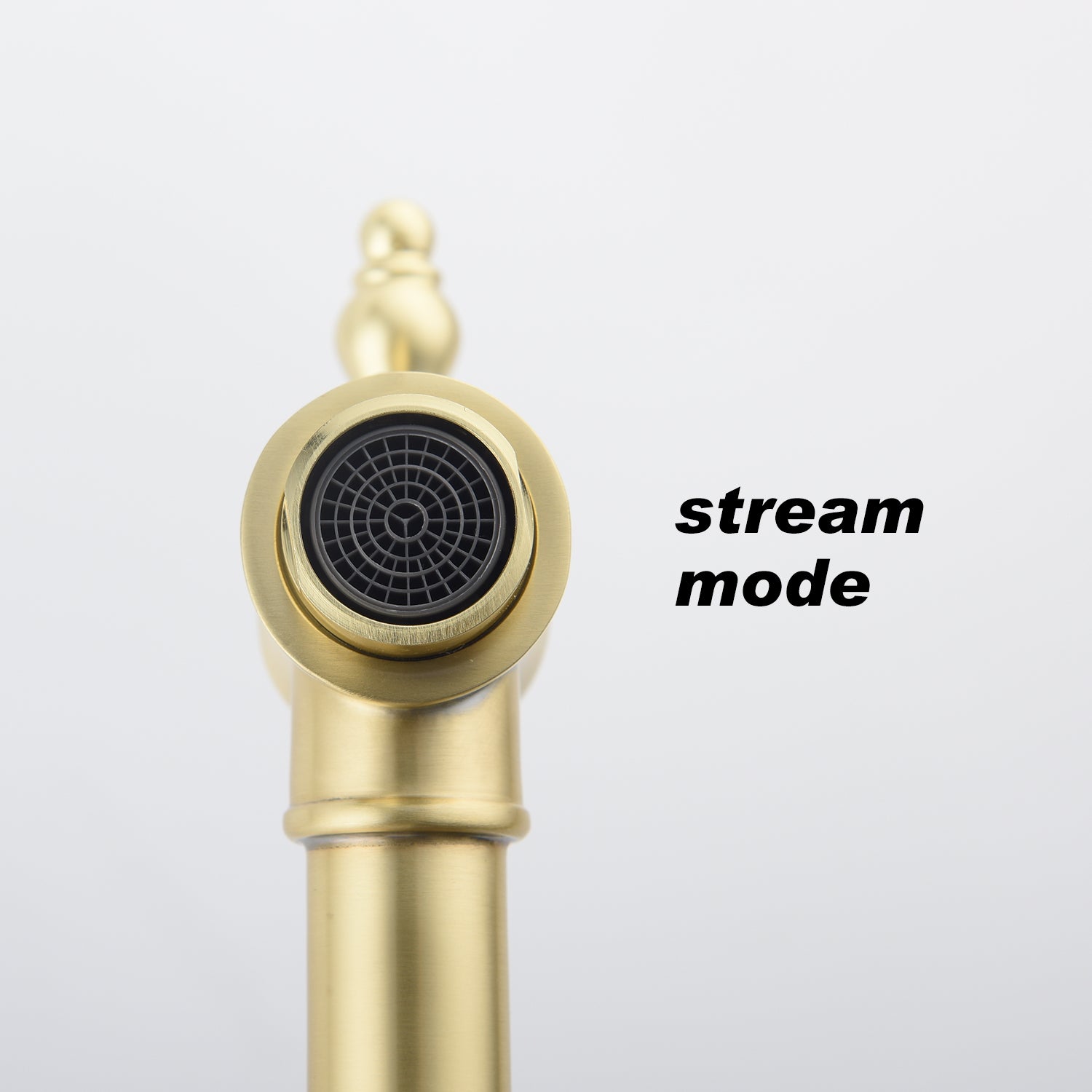 Gold shower head with black nozzle labeled 'stream mode' on a white background